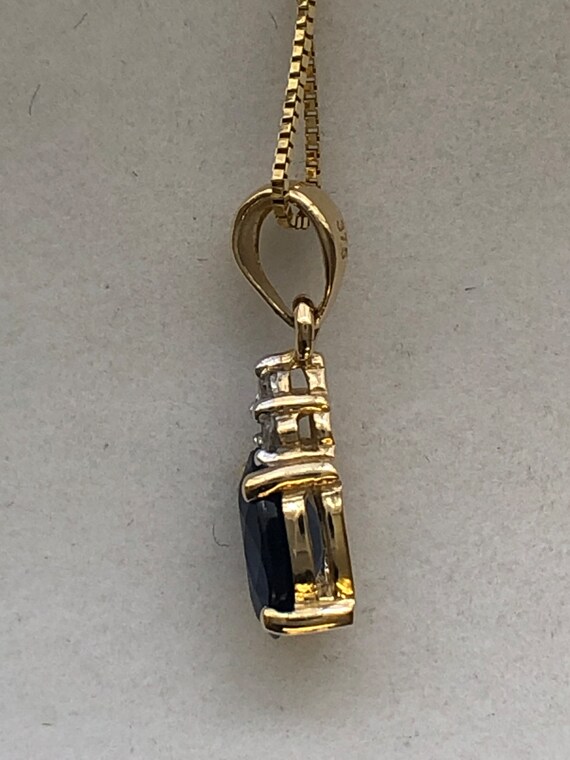 A 9ct gold sapphire and diamond pendant - image 6