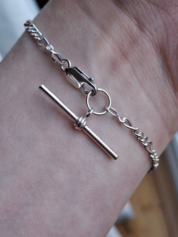 A vintage solid silver figaro link bracelet with … - image 4