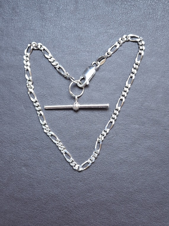 A vintage solid silver figaro link bracelet with … - image 10