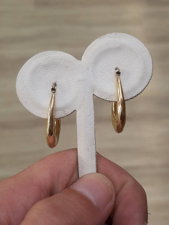 A vintage pair of 9ct gold hoop earrings - image 3
