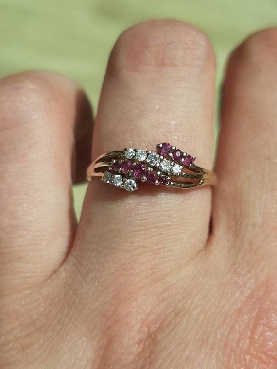 A vintage 9ct gold and ruby and diamond ring - image 1