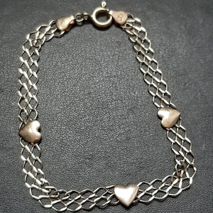 78 9ct GLD Heart Brclt