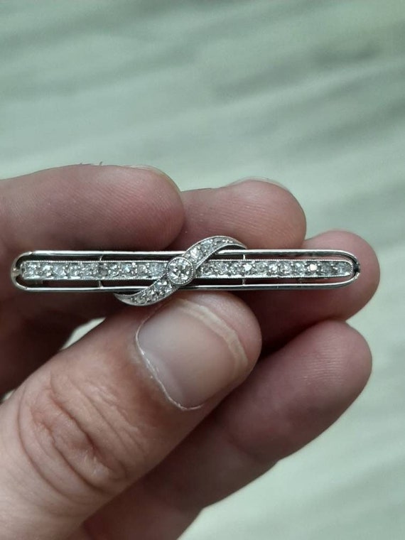 A stunning Art Deco 18ct gold and platinum diamond