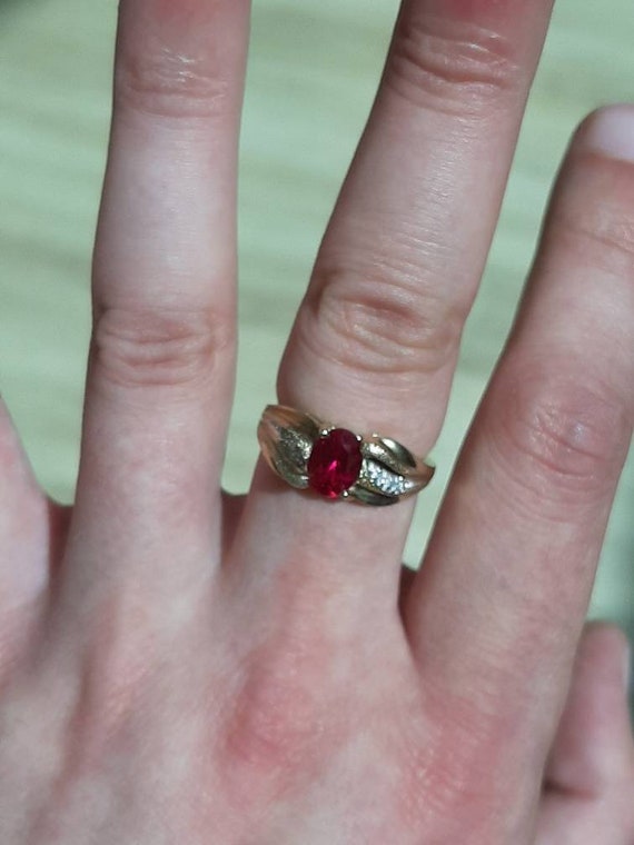 A 9ct gold ruby and diamond ring - image 2