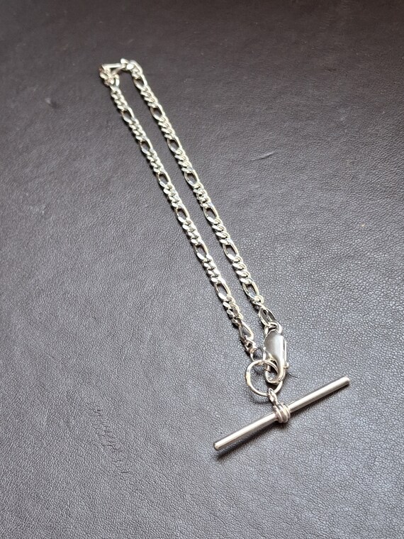A vintage solid silver figaro link bracelet with … - image 7