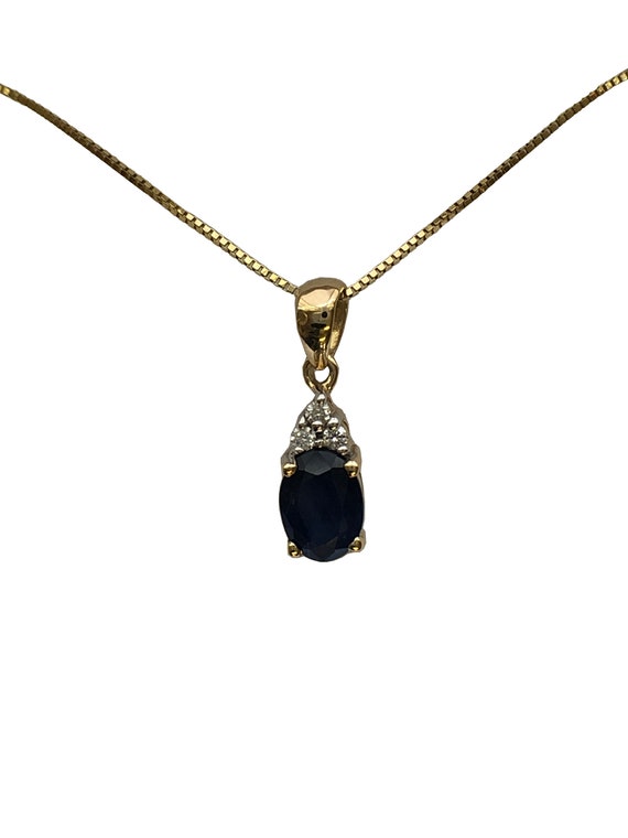 A 9ct gold sapphire and diamond pendant - image 9