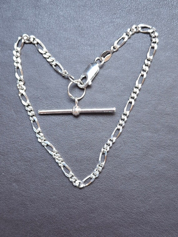 A vintage solid silver figaro link bracelet with … - image 9