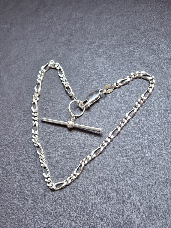 A vintage solid silver figaro link bracelet with … - image 8