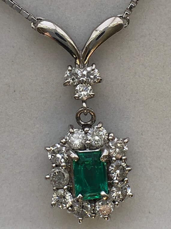 Platinum and 2024 emerald necklace