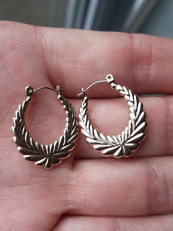 A vintage pair of 9ct gold hoop earrings