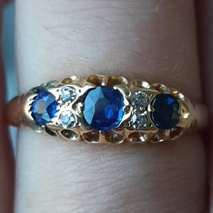 An antique 18ct gold sapphire and diamond ring