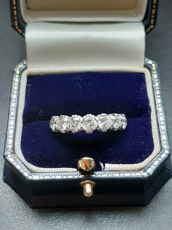 A vintage 18ct gold and platinum Art Deco 2 carat diamond seven stone ring