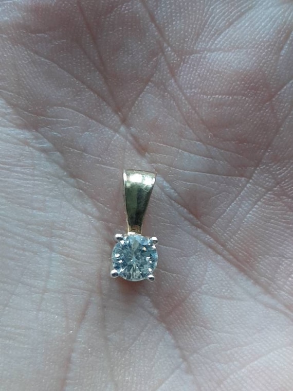 A 9ct gold diamond pendant
