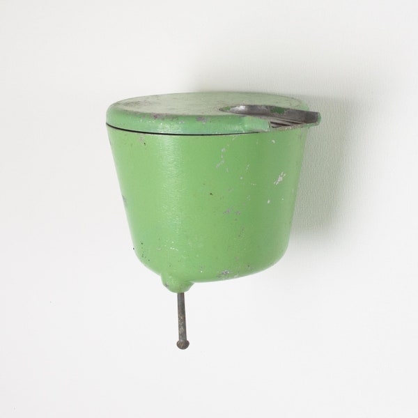 Vintage metal washbasin. Ancient metal garden hand basin. Lavabo. Garden green washstand. Industrial outdoor decoration