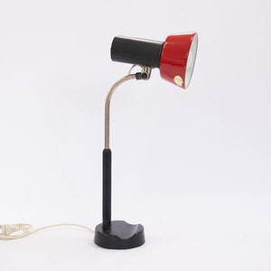 Vintage red table lamp. Metal desk lamp in red and black. Retro table night lamp. Vintage reading lamp.