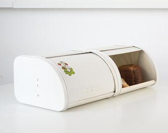 Vintage metal bread box. Retro white bread bin - atomic space age design.