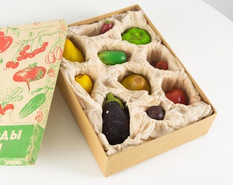 Vintage wax vegetables in the original box. Vintage decorative vegetables. Didactic wax models. Vintage realistic fruit models.