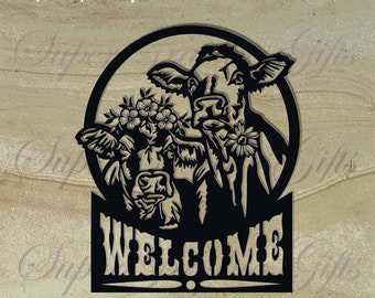 May include: Black metal sign featuring two cows within a circular frame, one adorned with flowers and the other with a sunflower. The word "WELCOME" is displayed below. The sign includes the text "DXF PNG EPS SVG PDF".