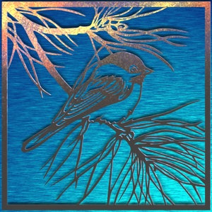 May include: A metal wall art piece featuring a bird perched on a branch. The bird and branches are a dark metallic color, set against a textured blue background. The artwork is framed with a dark border.