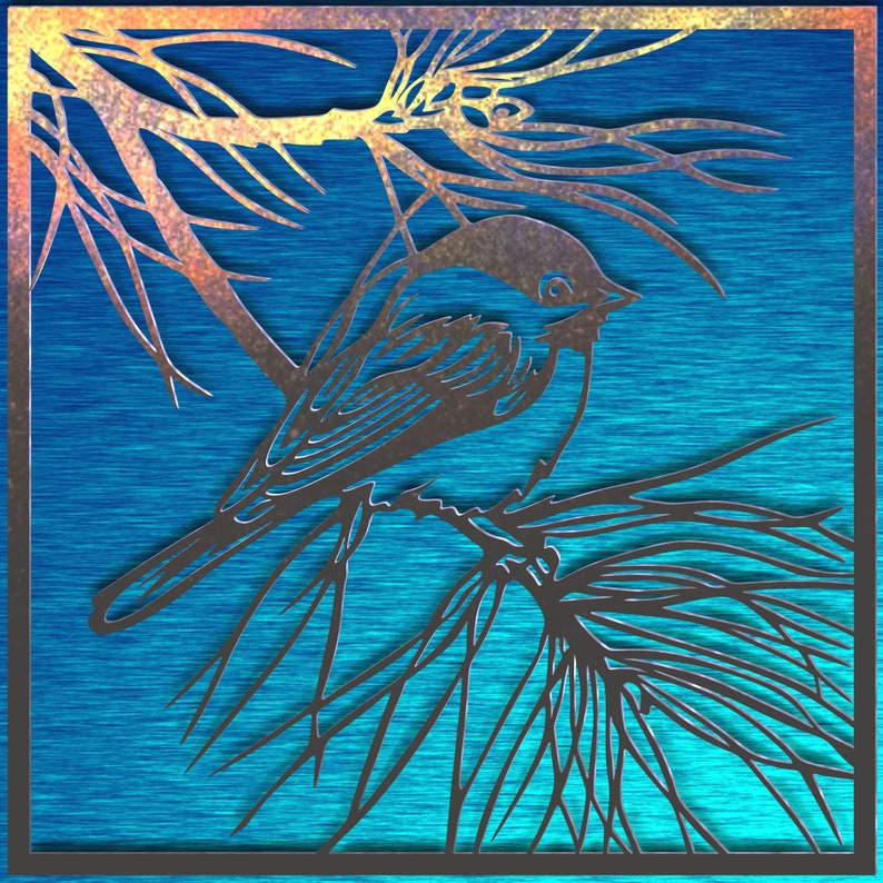 May include: A metal wall art piece featuring a bird perched on a branch. The bird and branches are a dark metallic color, set against a textured blue background. The artwork is framed with a dark border.