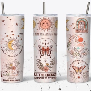 May include: Three stainless steel tumblers with pink and brown designs featuring celestial and floral motifs. The tumblers have inspirational quotes such as "Live Love By The Sun", "Never Be Afraid Of Change", and "Make Your Own Magic".