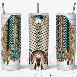 May include: Three stainless steel tumblers with a Native American design. The tumblers feature a turquoise and gold beaded design with feathers and a headdress.