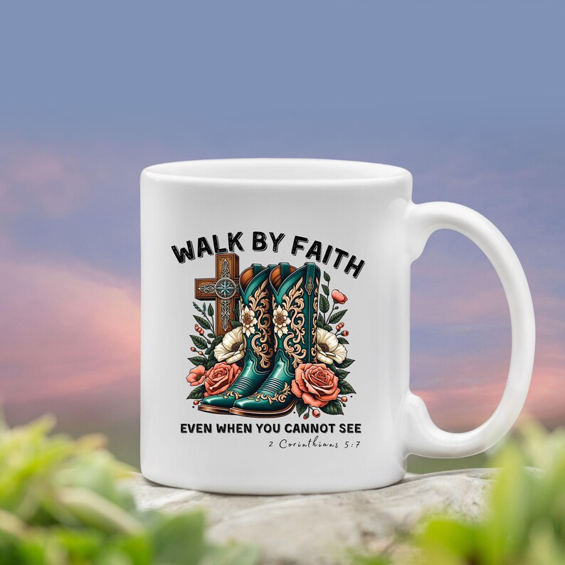 May include: White ceramic mug with a teal green and brown design featuring a cross, cowboy boots, and flowers. The text "Walk by Faith Even When You Cannot See 2 Corinthians 5:7" is printed on the mug.