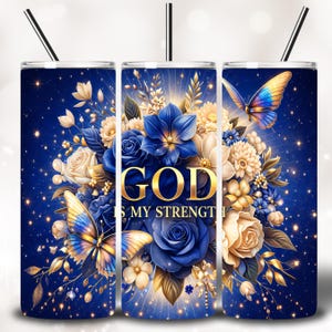 May include: A blue tumbler with a floral design featuring blue roses, white and gold flowers, and butterflies. The words "GOD IS MY STRENGTH" are in gold lettering. The tumbler has a black straw.