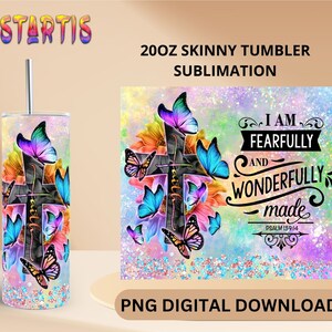 May include: A 20 ounce skinny tumbler sublimation design featuring a cross with butterflies and flowers. The design includes the text "I am fearfully and wonderfully made" and "Psalm 139:14".