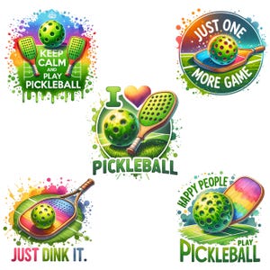 May include: Five colorful illustrations of pickleball paddles and balls with text overlays. The illustrations feature a green and white pickleball, a rainbow paddle, a heart-shaped paddle, and a green and white paddle. The text includes "Keep Calm and Play Pickleball", "Just One More Game", "I Pickleball", "Just Dink It", and "Happy People Play Pickleball".