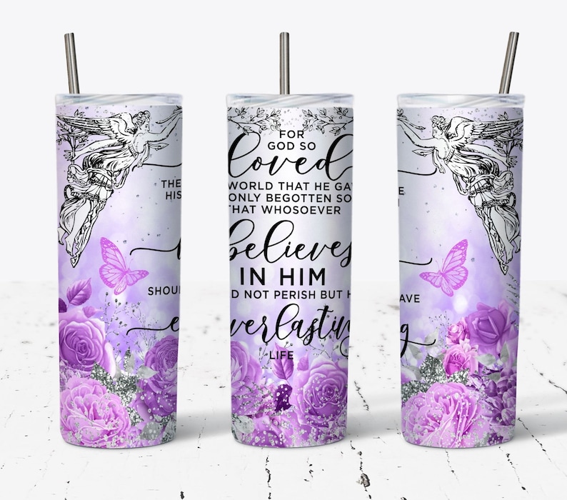 May include: A purple and silver tumbler with a floral design and an angel with the text "For God so loved the world that he gave his only begotten son that whosoever believes in him should not perish but have everlasting life".