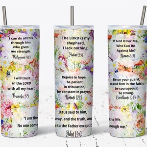 May include: Three stainless steel tumblers with floral designs and inspirational quotes. The quotes are: "I can do all this through him who gives me strength. Philippians 4:13", "The LORD is my shepherd, I lack nothing. Psalms 23:1", and "If God is for me, who can be against me? Romans 8:31".