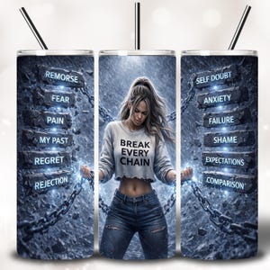 May include: A stainless steel tumbler with a black straw features a woman breaking chains. The text "BREAK EVERY CHAIN" is on her shirt. The tumbler design includes words like "REMORSE", "FEAR", "PAIN", "SELF DOUBT", and "ANXIETY".