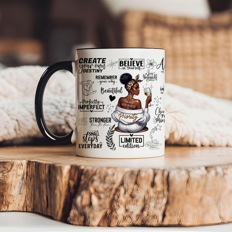May include: White ceramic mug with a black handle. The mug features a black and white illustration of a woman with a crown of flowers and a glass of wine. The mug is decorated with inspirational quotes, including "Create your own destiny", "Believe in yourself", "Love yourself", "Make yourself a priority", "Perfectly imperfect", "Stronger from the storm", "Small steps everyday", and "Limited edition".