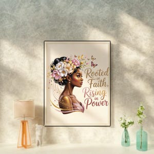 May include: A framed art print featuring a profile of a Black woman adorned with a floral crown and butterflies. The artwork includes the text "Rooted in Faith, Rising in Power" in elegant script, with a soft color palette.