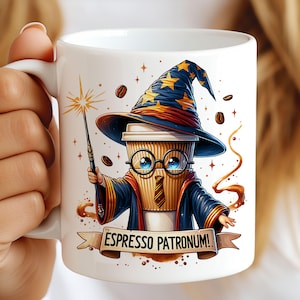 May include: White ceramic coffee mug featuring a whimsical illustration of a coffee cup dressed as a wizard, complete with a hat, glasses, and a wand. The design includes the phrase "Espresso Patronum!" on a banner, coffee beans, and star accents.