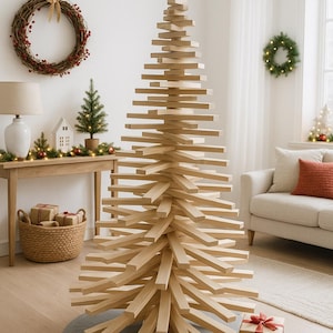 May include: A tall, conical Christmas tree constructed from stacked, horizontal light-colored wooden slats. The structure features a central vertical support and is topped with a simple wooden star ornament. Three wrapped gift boxes sit at the base.