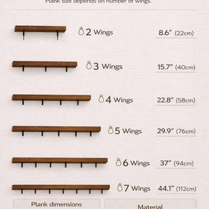 May include: A product information graphic showing plank mount sizes. The planks are made of natural alder wood and come in various lengths, from 8.6 inches (22cm) to 44.1 inches (112cm), depending on the number of wings. The width is 2.75 inches (7 cm) and the thickness is 1.18 inches (3 cm).