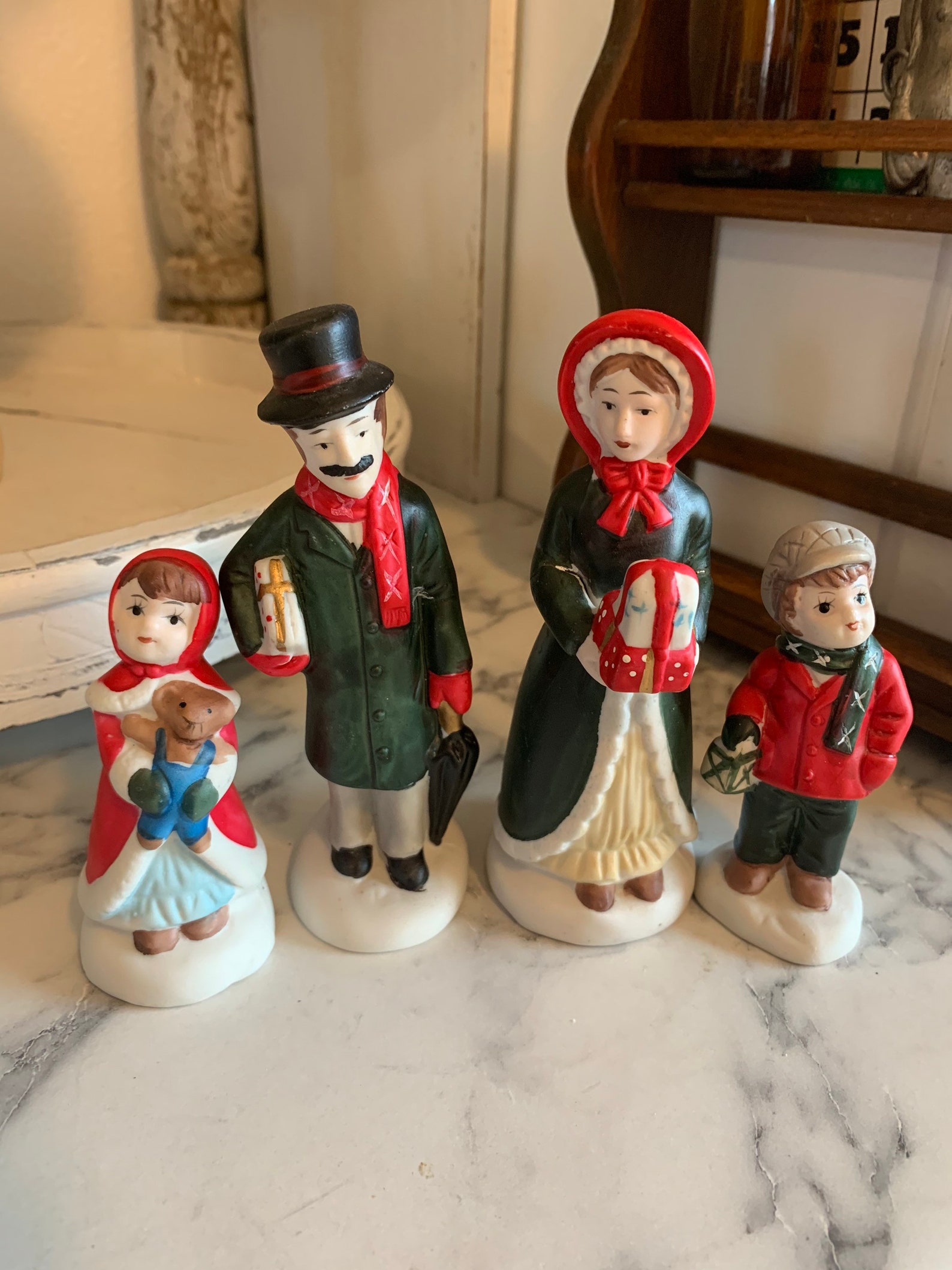 Christmas Carolers Caroling Figurines Set of Four Porcelain Etsy Christmas Caroling Figurines