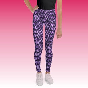 May include: Purple leggings with a dragon scale pattern.