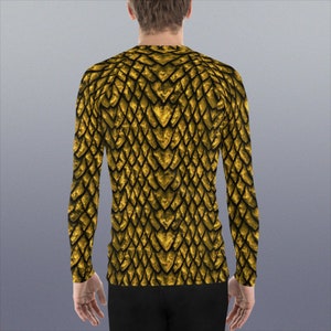 May include: A long-sleeved shirt with a gold dragon scale pattern.