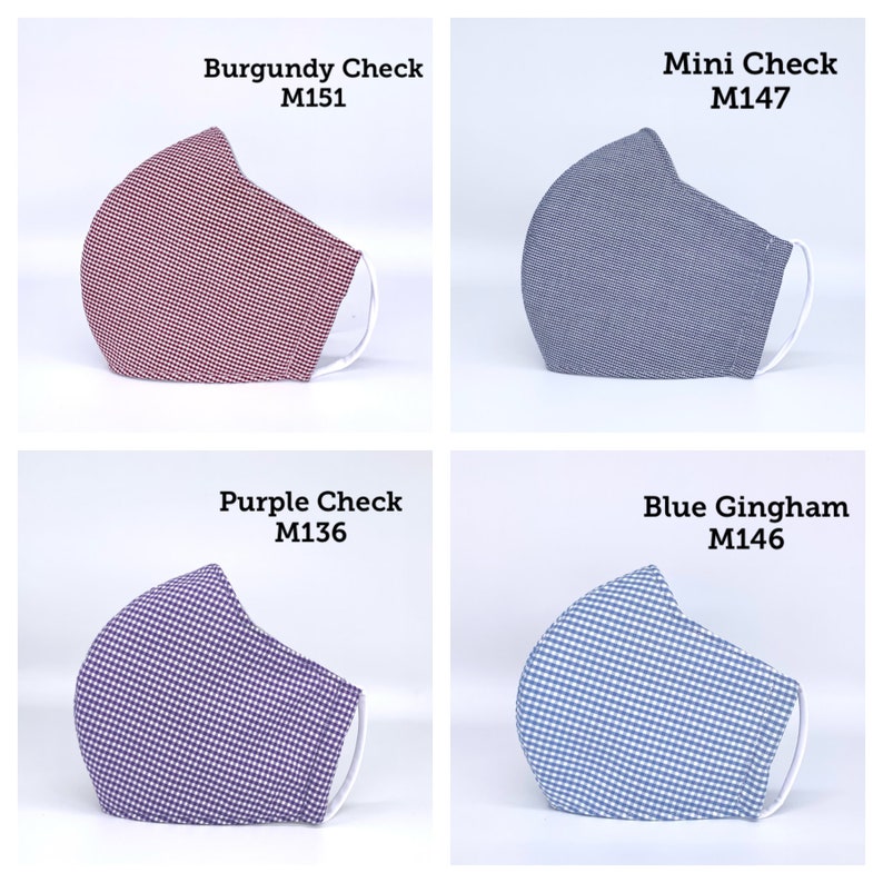 May include: Four different patterned face masks. The masks are all the same style, with a white elastic band and a white nose wire. The masks are in the following colors and patterns: burgundy check, mini check, purple check, and blue gingham.