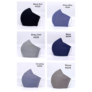 May include: Six different fabric face masks in various colors and patterns, including black, grey, blue, and brown. Each mask has a white elastic band and is labeled with a color and a code, such as "Black Dot M220" and "Silver Blue M216".