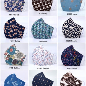 May include: Twelve different fabric face masks with various patterns, including floral, geometric, and abstract designs. Each mask is labeled with a unique code and name, such as "M248 Ivy" and "M257 Daisy".