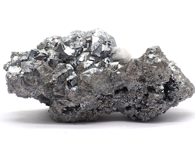 Skuterudite with quartz 105mm x 45mm (334gram). Rare! Good quality. Ethically sourced and fair trade mineral. Cluster of skuterudite.