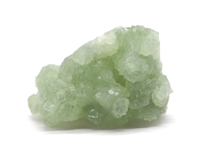 Prehnite 45mm x 30mm (47 grams). Grape crystallized. Beautiful quality. Pure energy. Fair trade minerals. Ethically sourced.