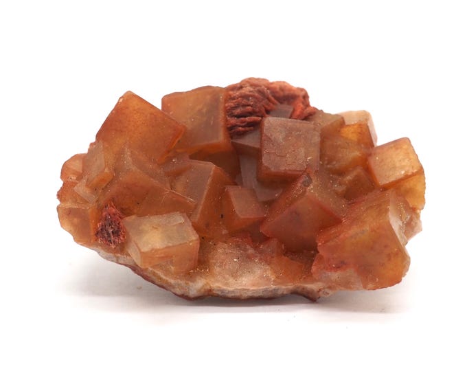 Fluorite cluster 50mm x 30mm (39 grams). Unique and special. Cubes. Ethically found and fair trade. Hematite layer. Crystals from Morocco.