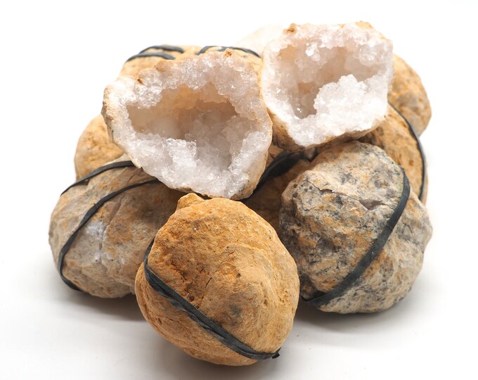 Complete geode calcite/quartz. +/- 80mm - 60mm. Different formats. Opened. Ethically sourced and fair trade mineral.
