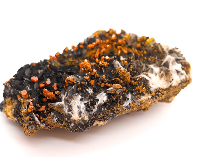 Vanadinite crystals on black barite