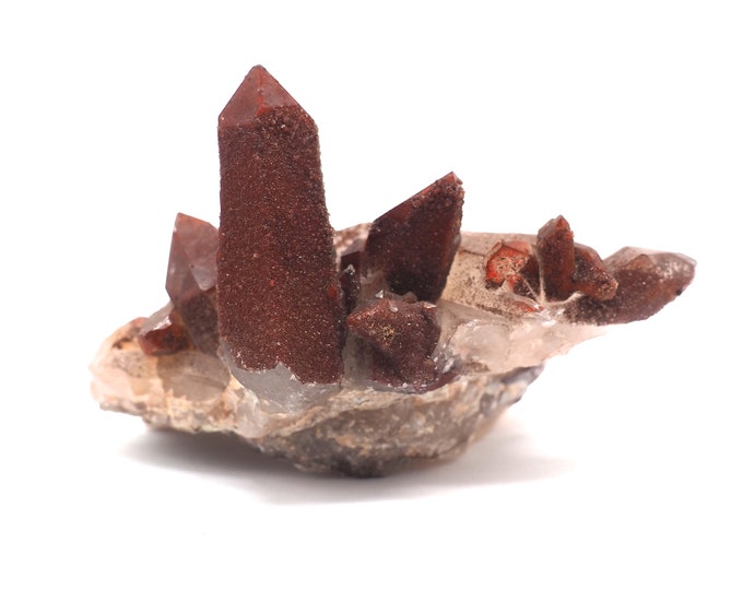 Rock crystal cluster with hematite layer 85mm x 50mm - 103 grams. Ethically sourced and fair trade mineral. From mine to market.